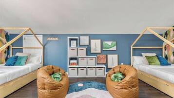 4 bedrooms, desk, iron/ironing board, travel crib
