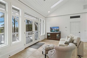 Smart TV, fireplace, books