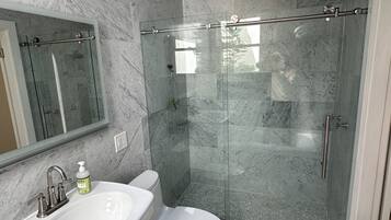 Hair dryer, towels, soap, shampoo