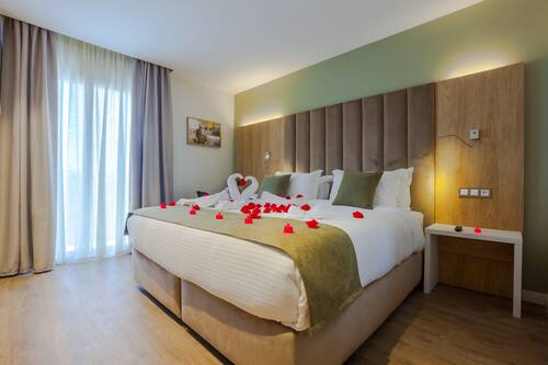 Luxe beddengoed, een minibar, een kluis op de kamer, een laptopwerkplek