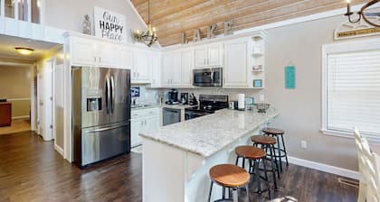 Lakefront home with two boat slips, lake views, firepit, grill, deck, & 2 kayaks