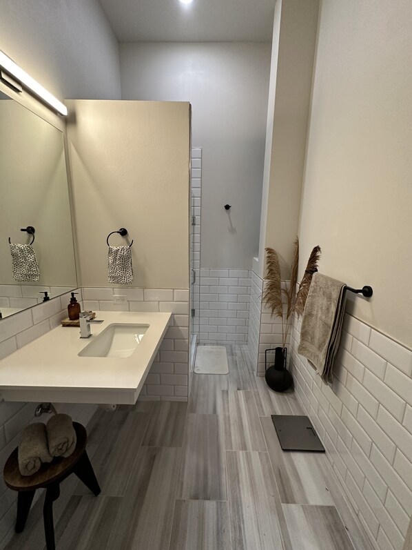 Hair dryer, towels, soap, toilet paper