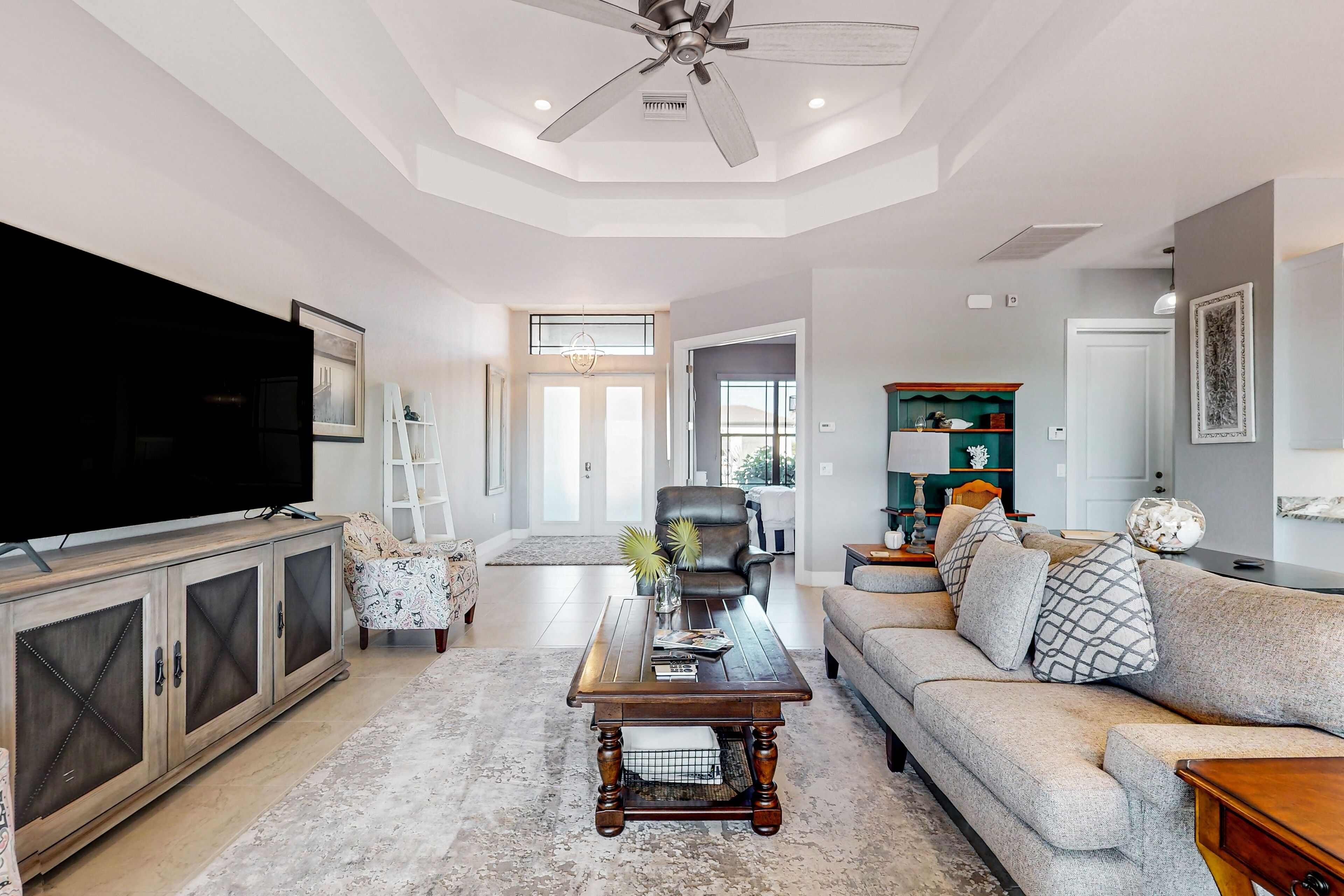 Open home with heated pool, dock, grill, beach gear, smart TVs, W/D, & AC