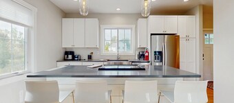 Newly-built home on a grassy lot with washer/dryer & screened deck