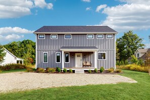 Exterior - Newly-built home on a grassy lot with washer/dryer & screened deck (Sawyer)