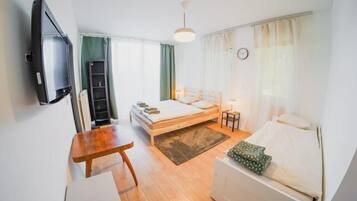 Standard Quadruple Room | 1 bedroom, free WiFi, bed sheets