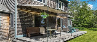 Waterfront stay with scenic deck, grill, smart TVs, shore access - dog-friendly