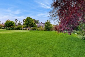 Property grounds - Dog-friendly retreat with patio, firepit, & tranquil river views - near beaches (West Harwich)