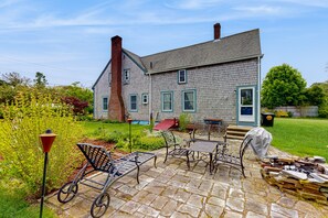 Outdoor dining - Dog-friendly retreat with patio, firepit, & tranquil river views - near beaches (West Harwich)