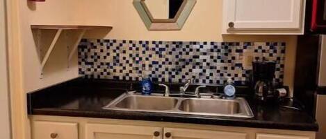 Fridge, microwave, coffee/tea maker, toaster