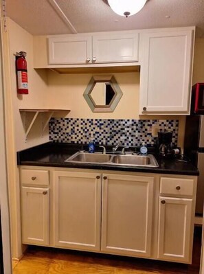 Fridge, microwave, coffee/tea maker, toaster
