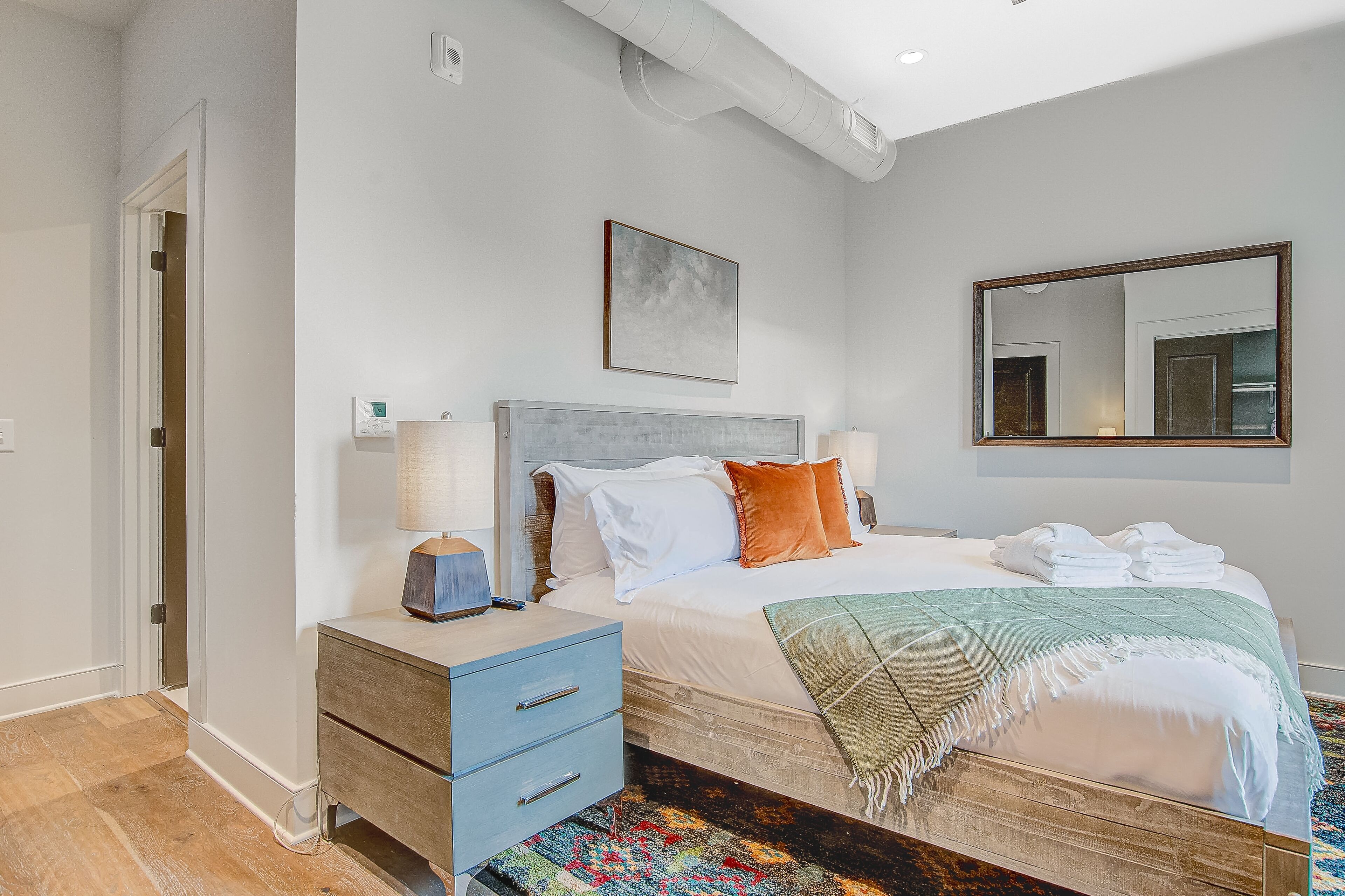 Charming downtown studio with a private balcony, central AC, & rooftop deck
