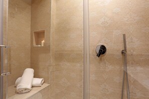 Shower, free toiletries, hair dryer, bidet