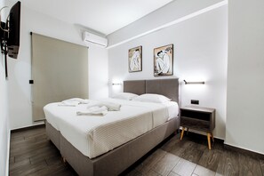 2 dormitorios, tabla de planchar con plancha, wifi gratis y ropa de cama