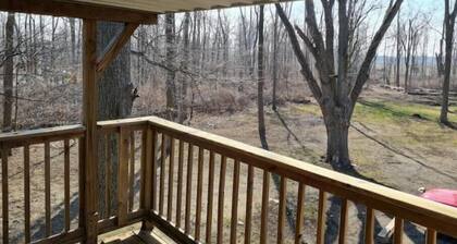 Nice Paneled Master Bed & Loft on Wooded Property