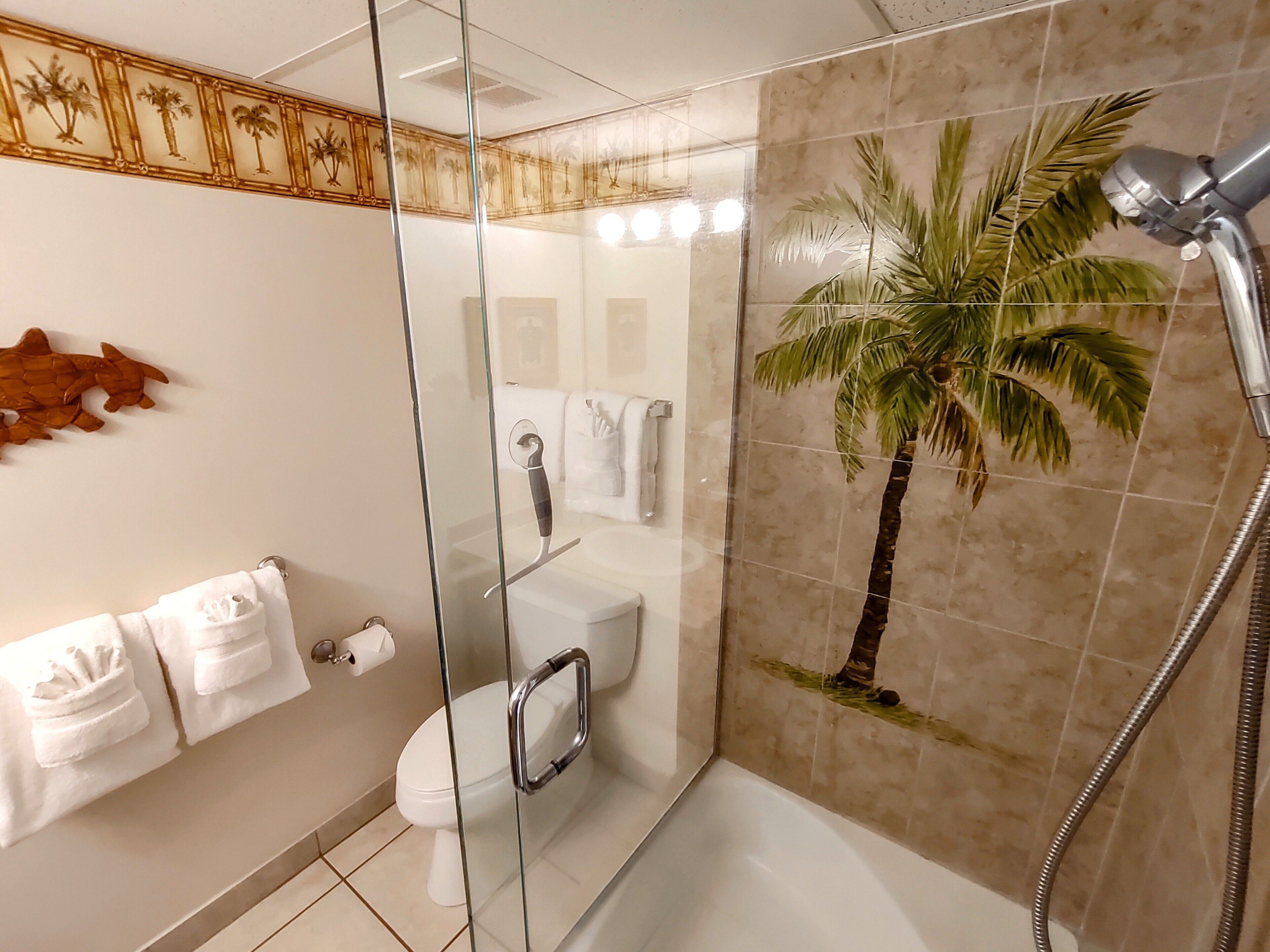 Shower, hair dryer, towels, shampoo