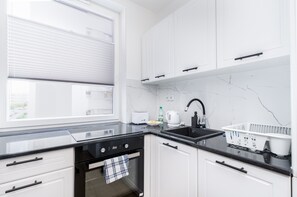 Refrigerador, horno, placa de cocina, lavavajillas