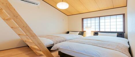 2 室のベッドルーム、デスク、WiFi (無料)、ベッドシーツ