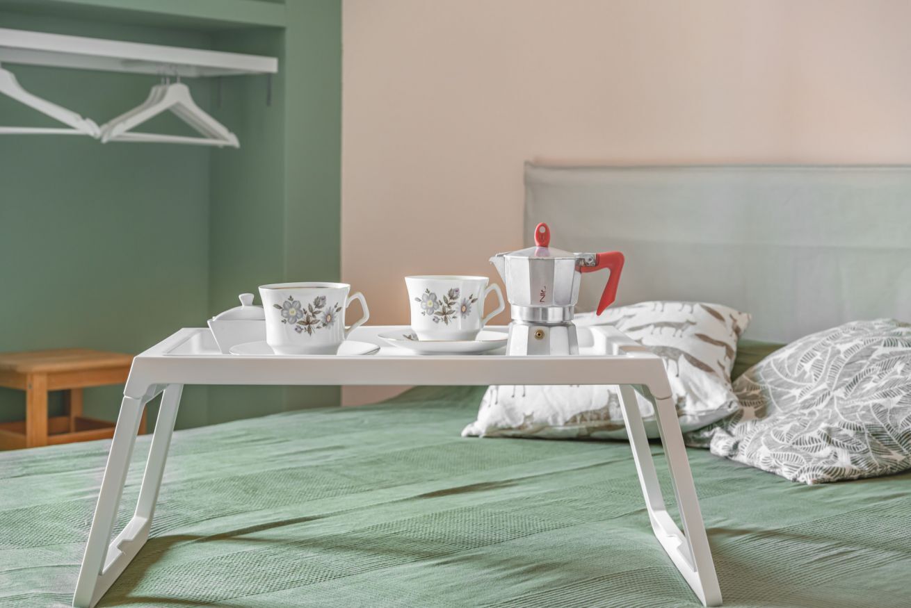 2 soverom, strykejern/-brett og sengetøy