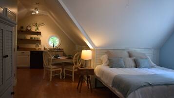 1 bedroom, desk, iron/ironing board, travel crib