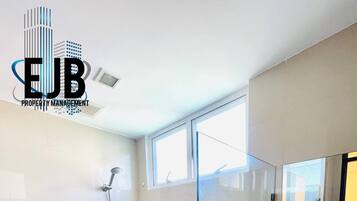 Deluxe Condo | 1 bedroom, in-room safe, blackout drapes, soundproofing