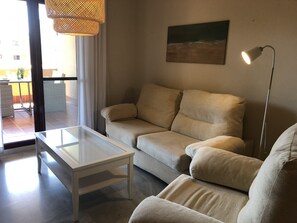 TV - Bright apartment with terrace and pool near the beach in Mijas Costa (Mijas Costa)