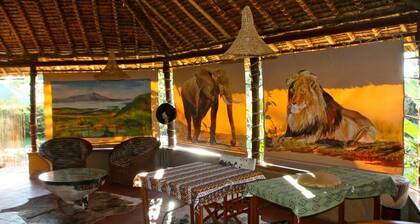Unwind Naturally: Find Serenity at Kenya's Buffalo's Rest Tented Camp!
