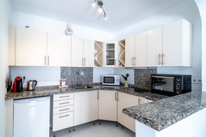 Fridge, microwave, oven, coffee/tea maker