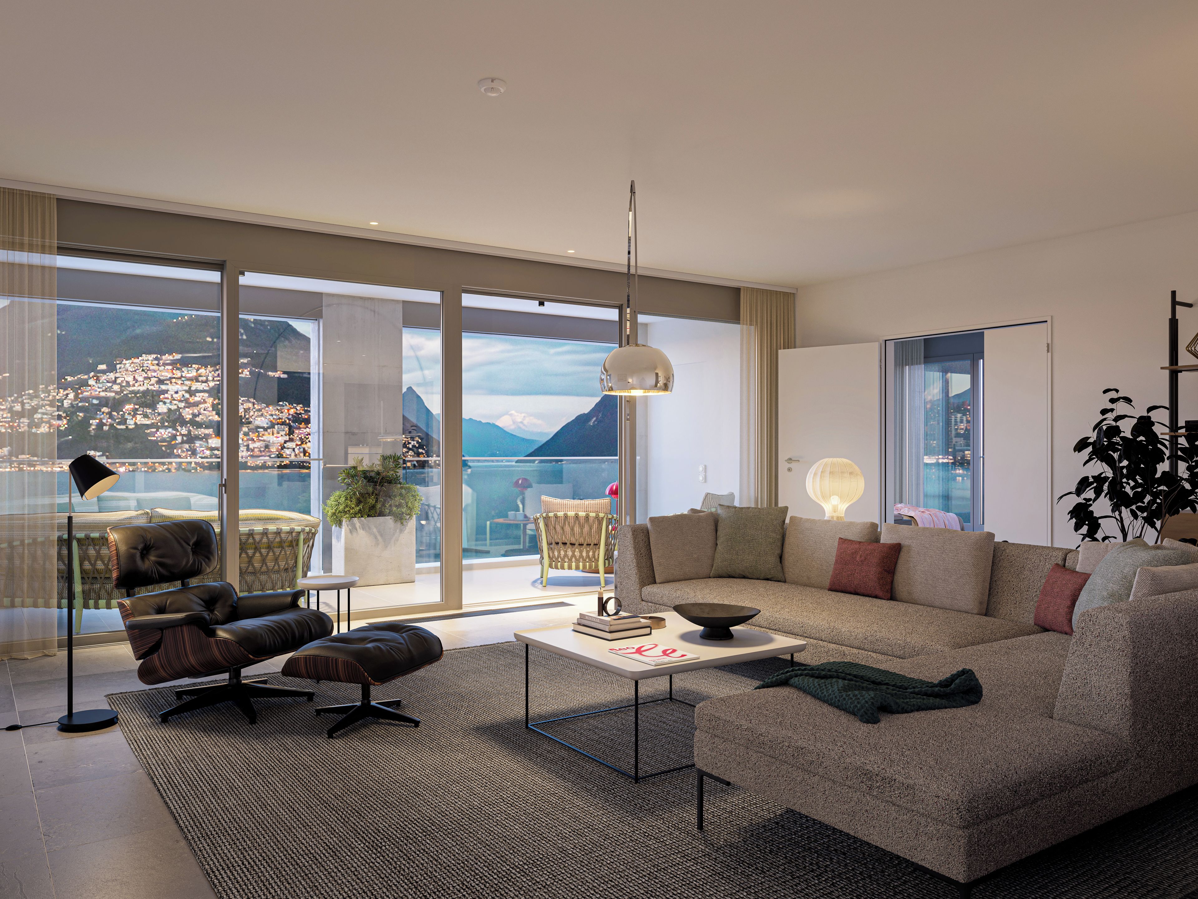 Una sala de estar moderna con un gran ventanal que ofrece vista a la ciudad, un sofá, una mesa de centro y una lámpara de pie.