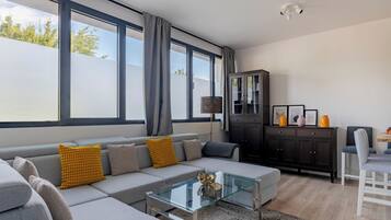 Classic Apartment | Living area | Flat-screen TV