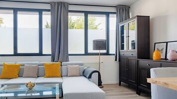 Classic Apartment | Living area | Flat-screen TV