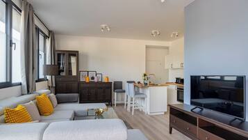 Classic Apartment | Living area | Flat-screen TV