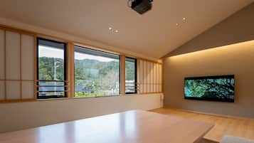 65-inch flat-screen TV with digital channels, heated floors