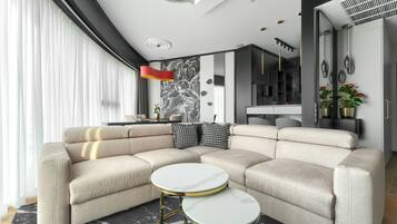 Elite Apartment | Living room | 150-cm flat-screen TV with cable channels