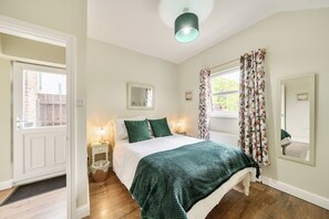 2 dormitorios, tabla de planchar con plancha, wifi gratis y ropa de cama
