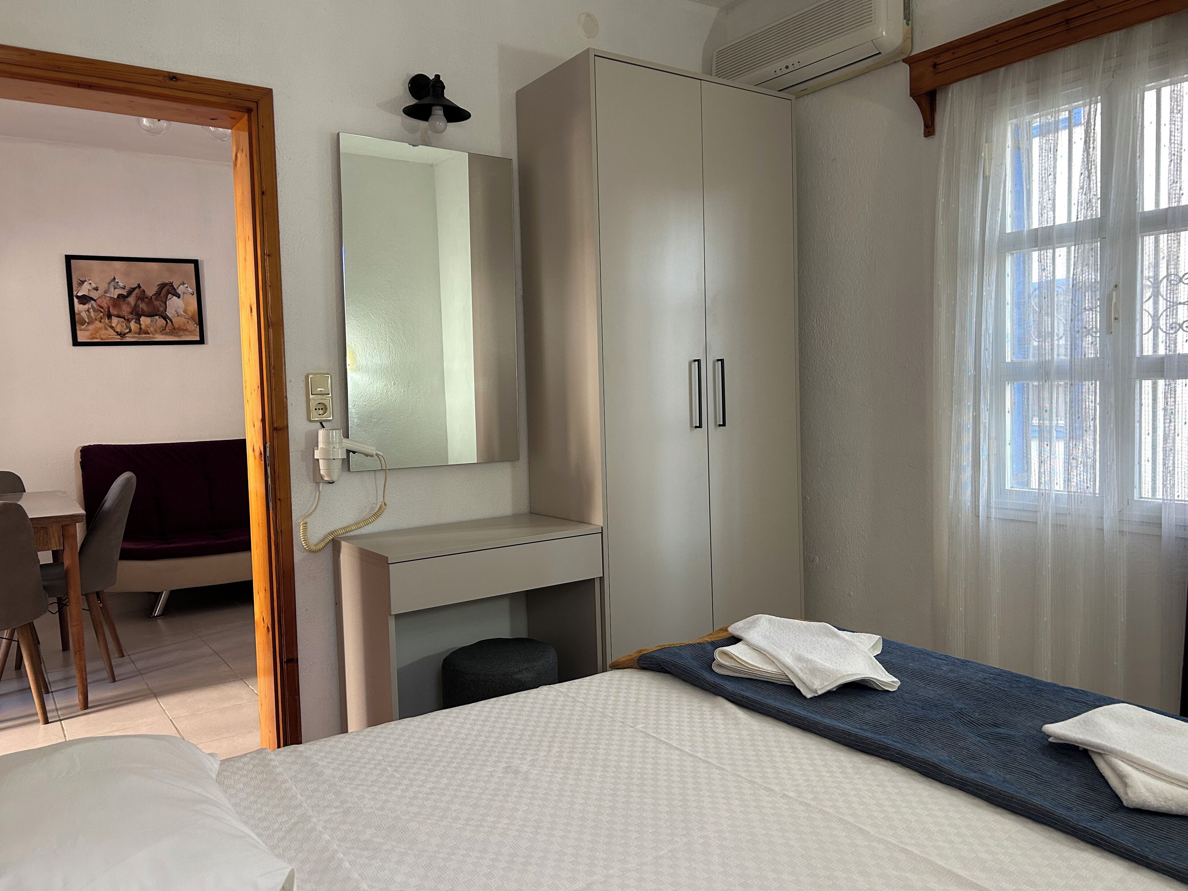 1 bedroom, desk, bed sheets