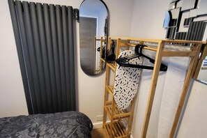 Departamento | 1 habitación, tabla de planchar con plancha, wifi gratis y ropa de cama 