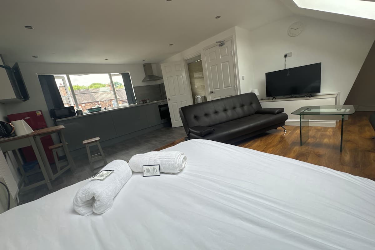 Exclusive Studio Suite | Individually decorated, individually furnished, desk, laptop workspace