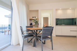 Superior Apartment | Living area | 32-inch LED TV with digital channels, streaming services