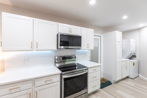 Fridge, microwave, dishwasher, coffee/tea maker
