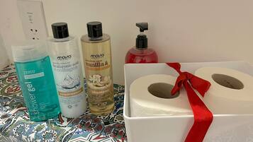Towels, soap, shampoo, toilet paper