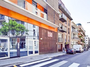 Urban living at its best, this building offers a mix of residential and commercial spaces with balconies and convenient street access.