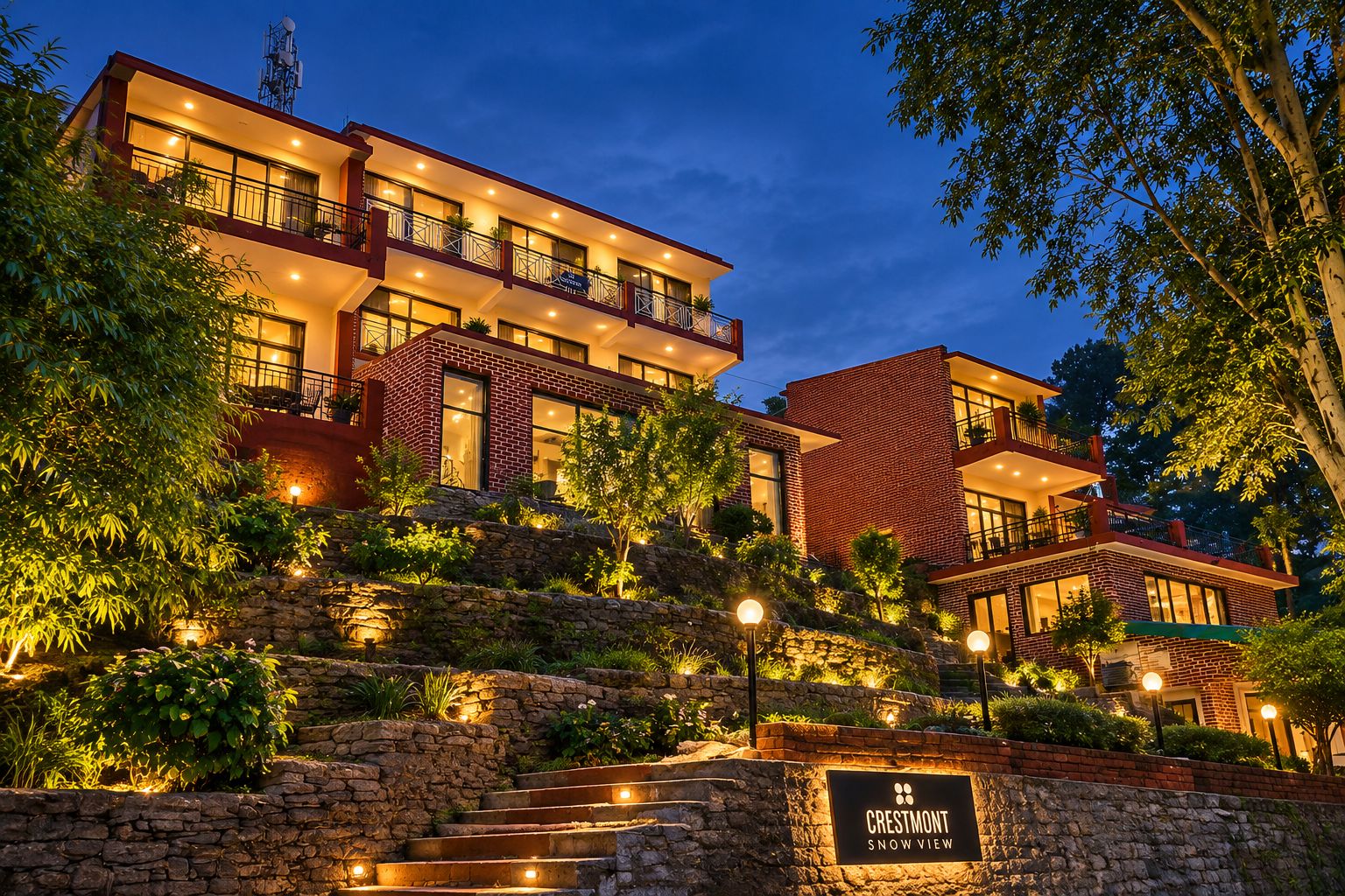 A multi-story hotel with a stone facade, multiple balconies, and a sign indicating 'Crestmont Snow View.'