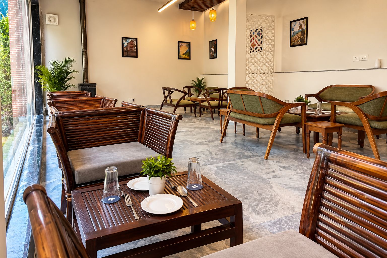 A dining area with wooden furniture, a table set for two, and a view of the outdoors.
