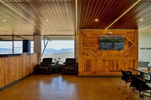 Deluxe Room, Balcony, Garden View | Terrace/patio