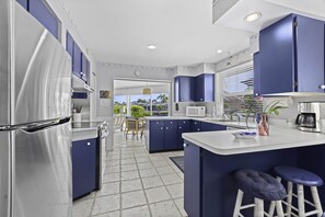 Fridge, microwave, oven, stovetop - Tropical Canal Home–Pool, Sun & Water Access: Paradise Cottage in LBK by RVA (Longboat Key)