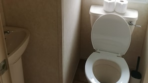 A bathroom with a toilet, bidet, and sink. - Plum 1 Coral Beach Ingoldmells 3 bed 8 Berth (Skegness)