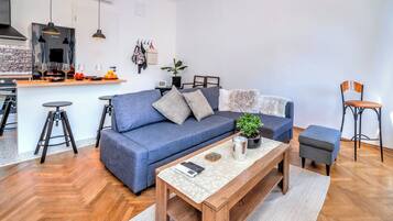 Family Apartment, 1 Bedroom, Microwave (City Soul Apartment) | Living area | Flat-screen TV