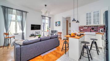 21-inch flat-screen TV with cable channels, TV