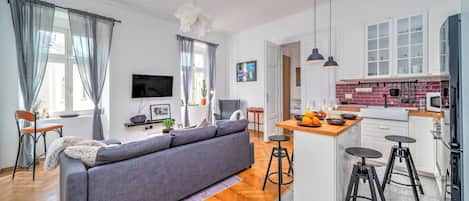 Family Apartment, Multiple Bedrooms (City Soul Apartment) | Living area | 21-inch flat-screen TV with cable channels, TV